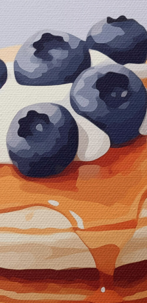 Stack of pancakes with blueberries and syrup on top Stack of pancakes with blueberries and syrup on top