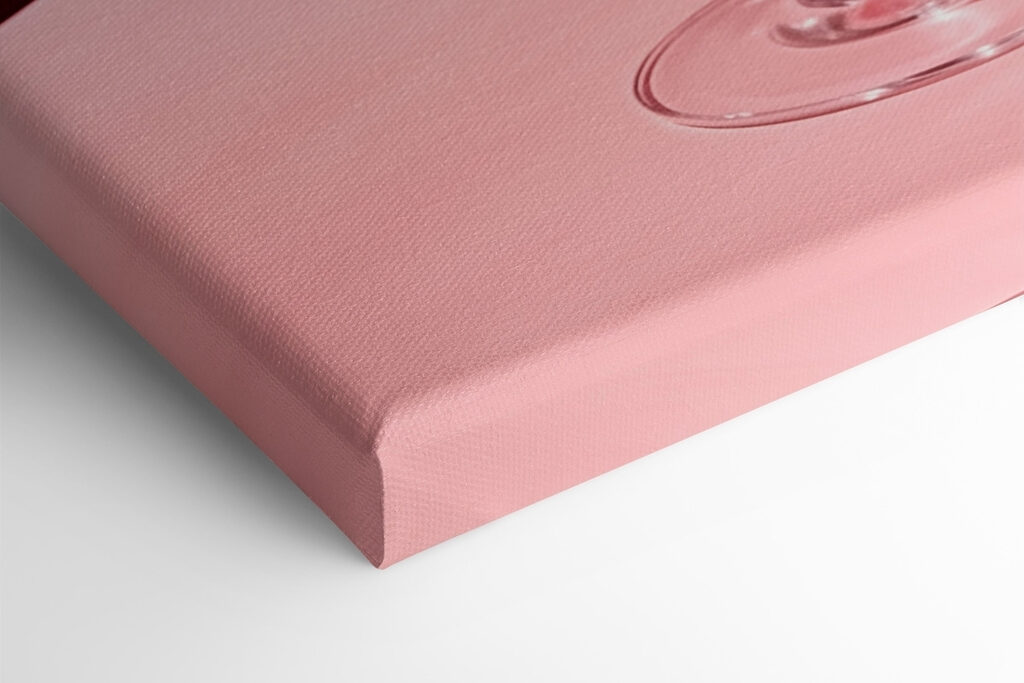 Glass with pink liquid and two cherries on it Glass with pink liquid and two cherries on it