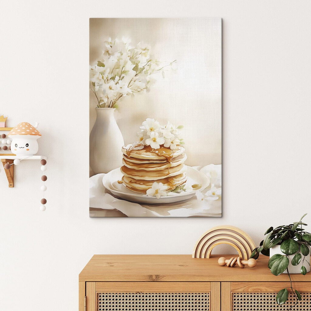 Stack of pancakes with flowers on top Stack of pancakes with flowers on top