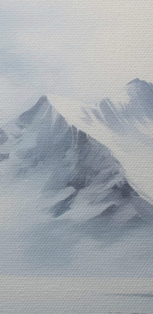 Snowy mountain range and a body of water Snowy mountain range and a body of water