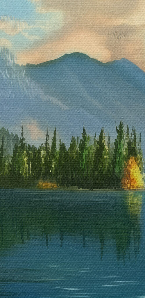 Boat on a lake surrounded by mountains