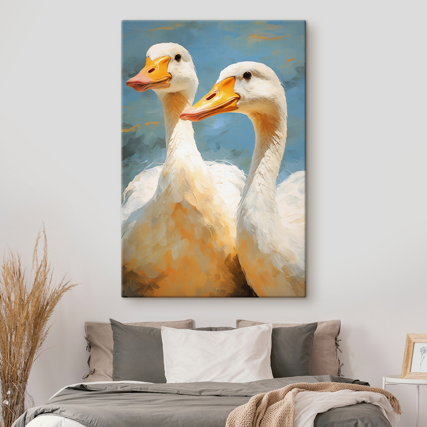 Pair of white ducks with orange beaks