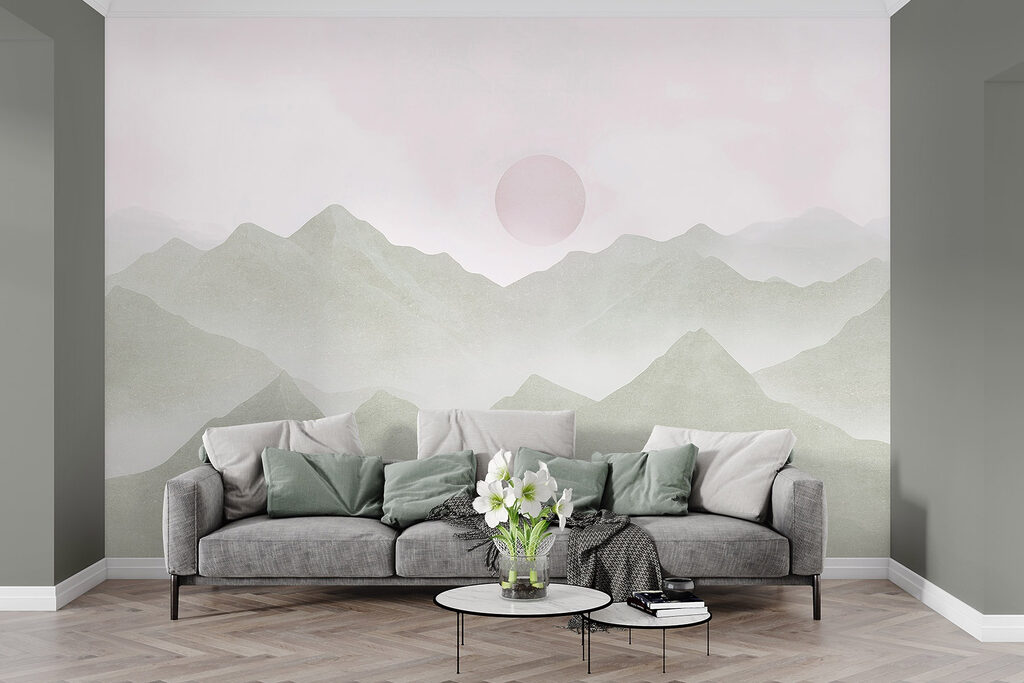 Mountain range with a sun in the distance