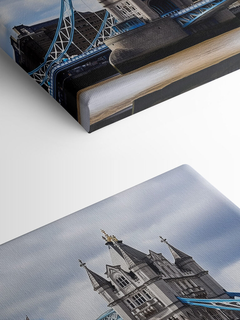 Bridge over water with towers and flags