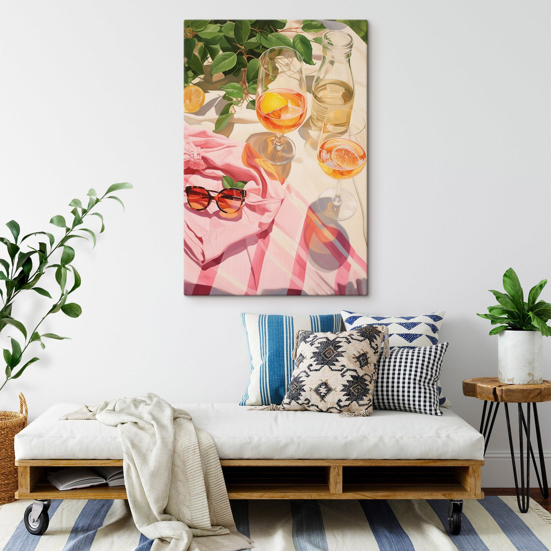 Group of glasses of wine and sunglasses on a blanket