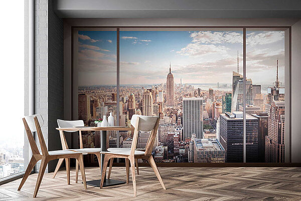 Large window with a city view Large window with a city view