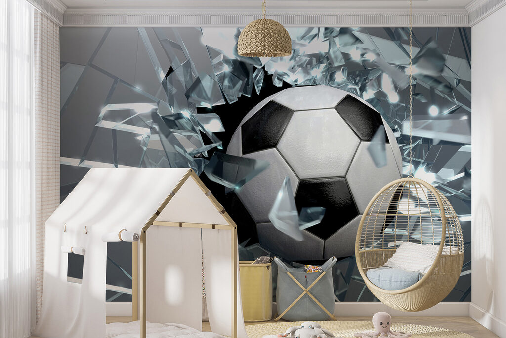 Football ball breaking through glass