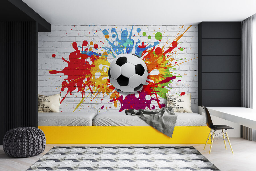 Futbalová lopta na tehlovej stene Futbalová lopta na tehlovej stene