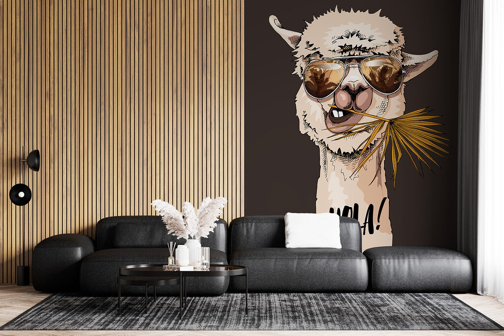 A llama wearing sunglasses and eating a leaf