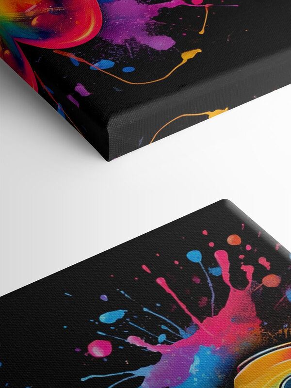 A video game controller with colorful paint splatters