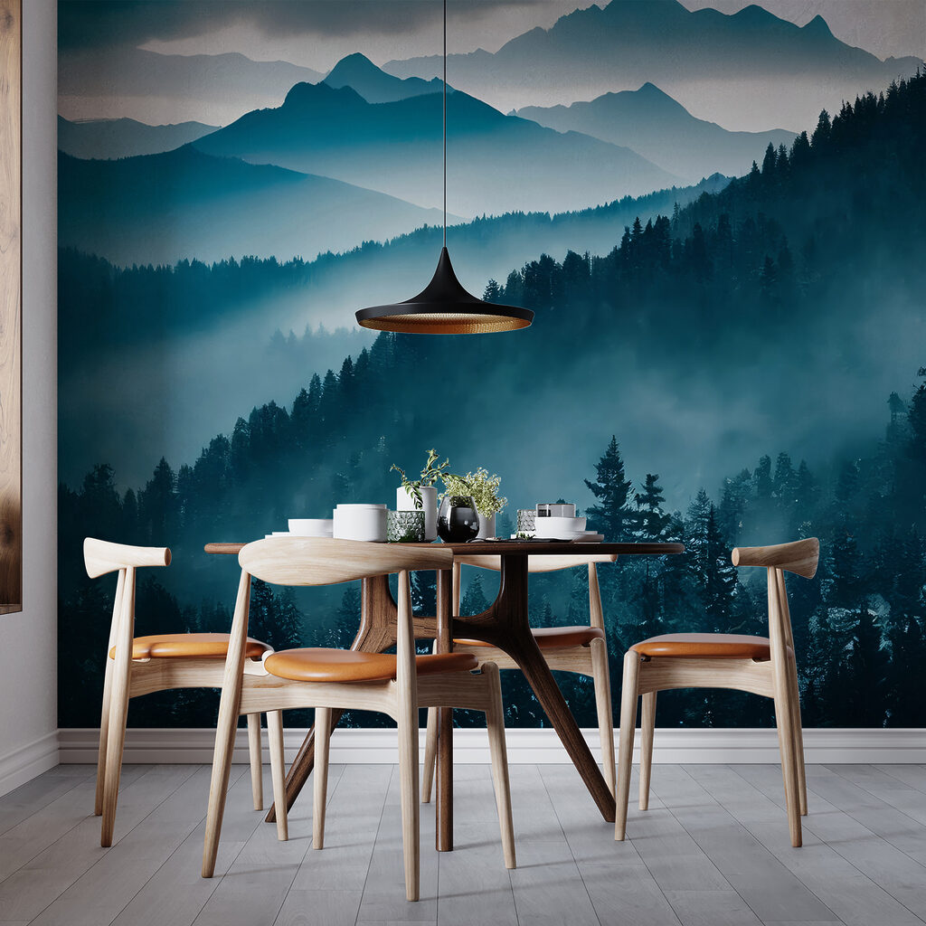 Mountain range with trees and fog