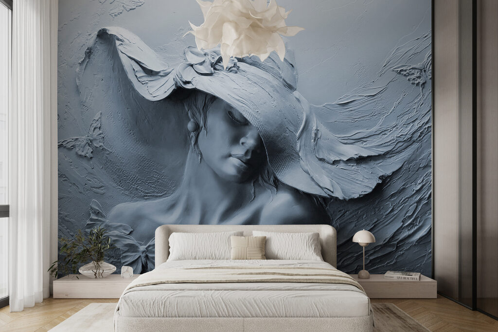 A sculpture of a woman in a hat