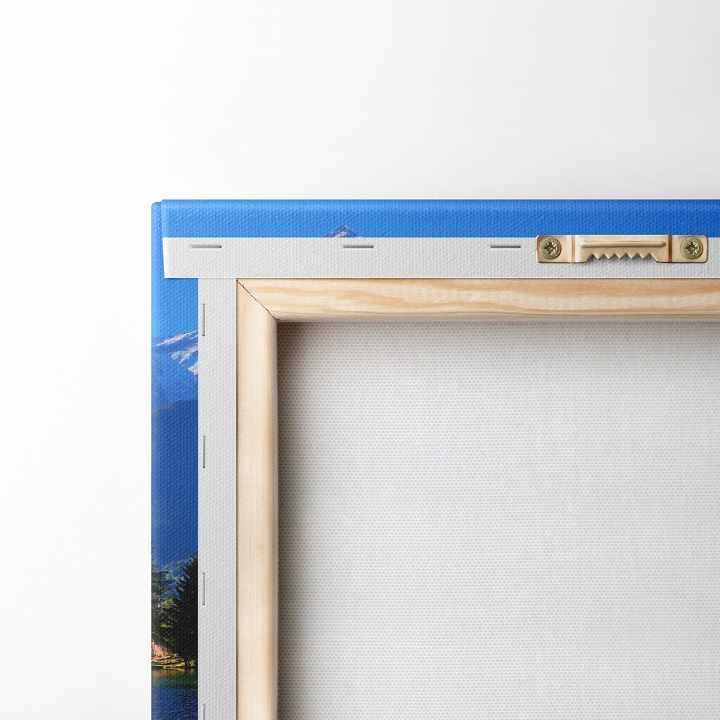 A lake surrounded by trees and mountains A lake surrounded by trees and mountains