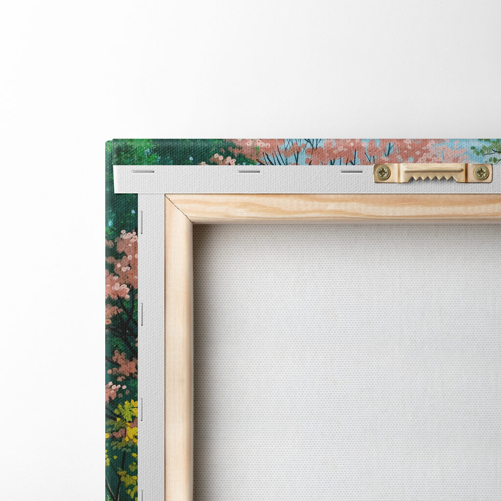 A dirt road through a grassy field with trees and a stone wall