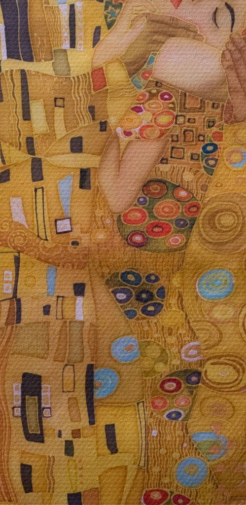 A painting of a man and woman kissing