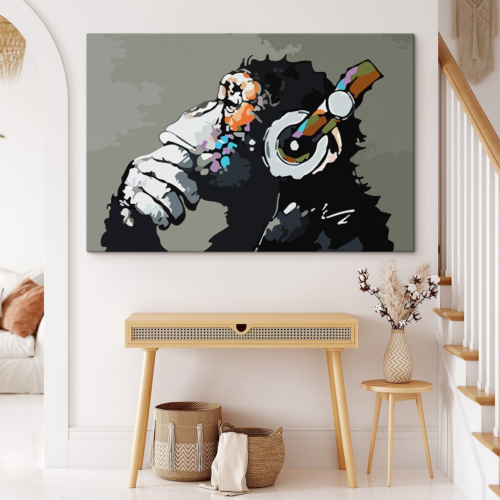 A cartoon of a monkey holding a headphone A cartoon of a monkey holding a headphone