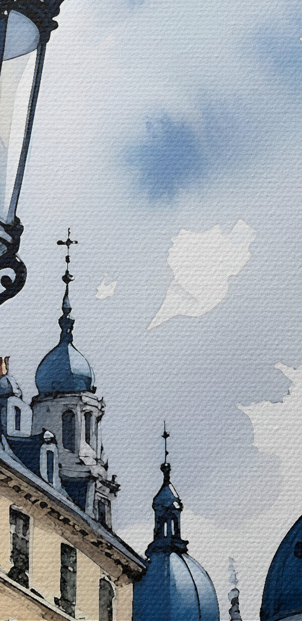 A street lamp with blue domes and buildings in the background A street lamp with blue domes and buildings in the background