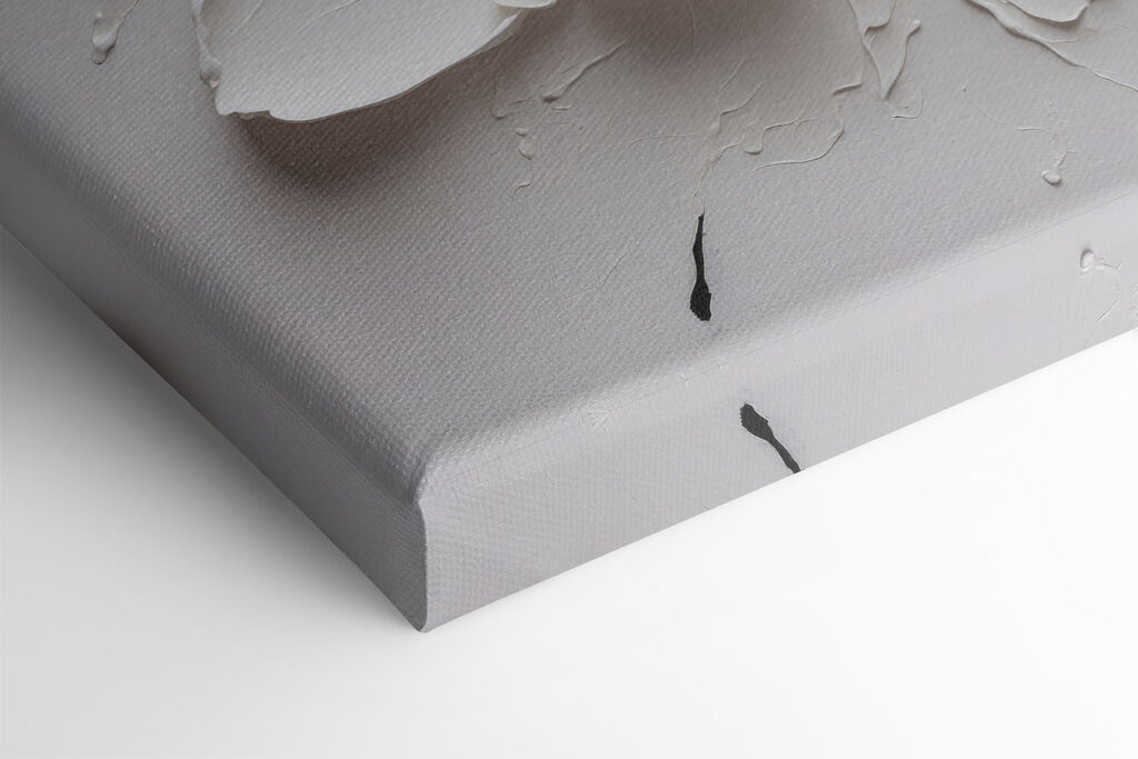 A white flower with black paint