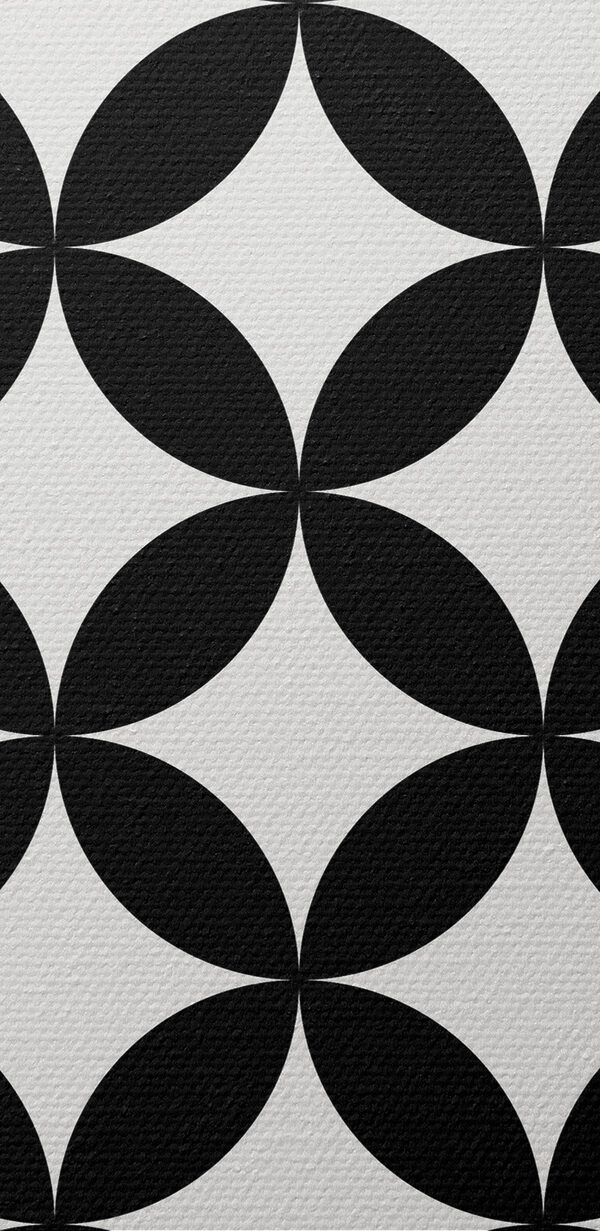 A black and white cover with a pattern of circles A black and white cover with a pattern of circles