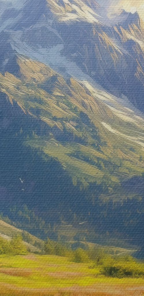 River running through a valley with mountains in the background