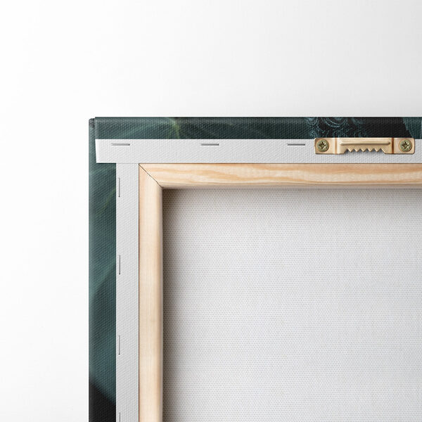 Statue of a person's face surrounded by leaves