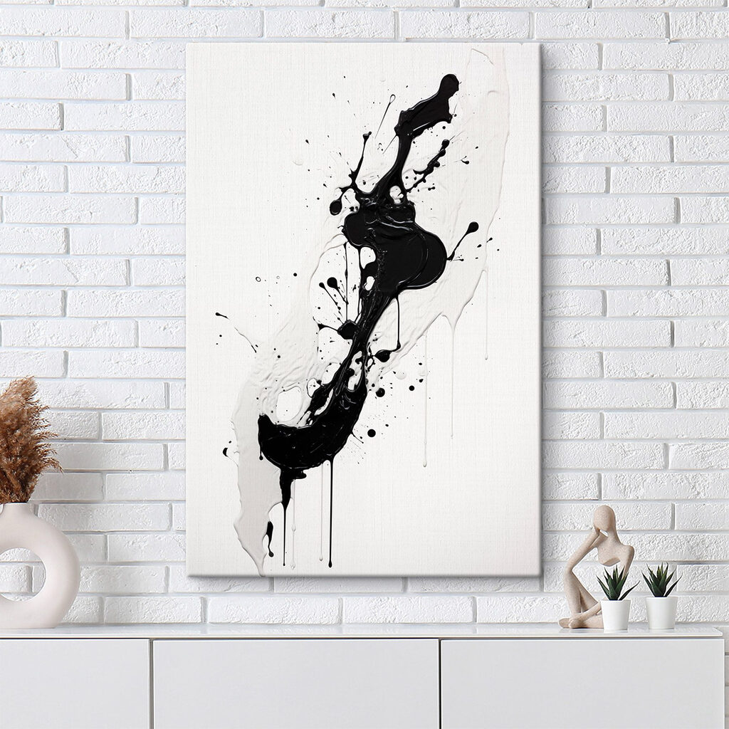 Black and white paint splattered on a white surface