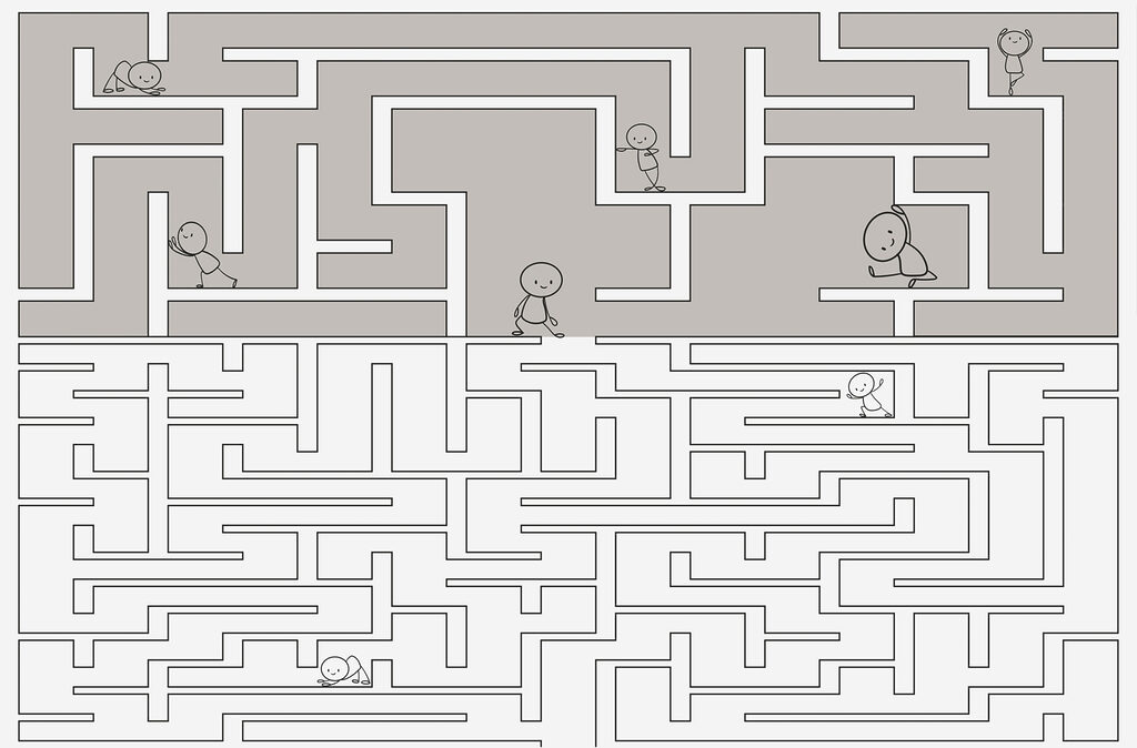 Maze with people walking on the ground