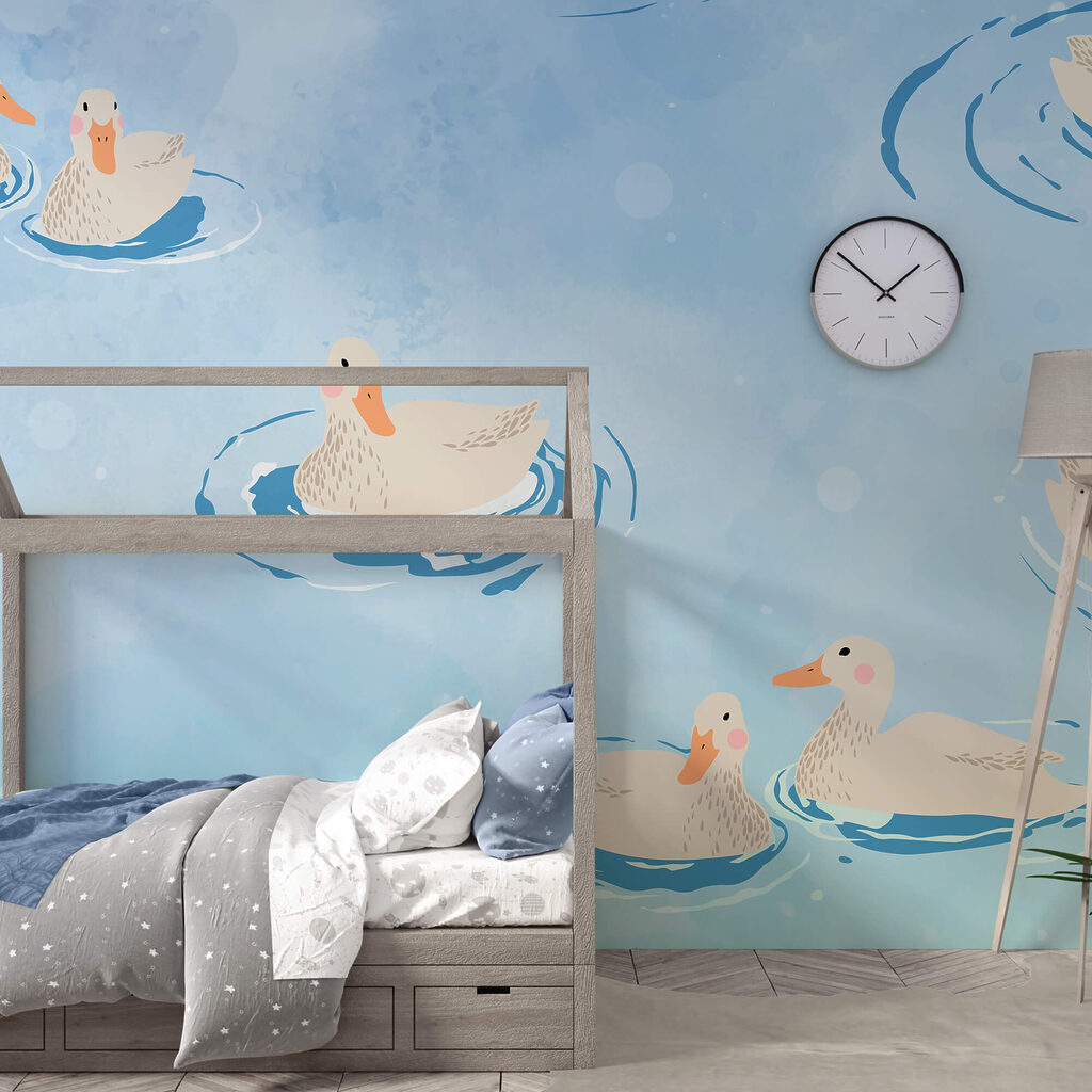 Skupina kačíc plávajúcich vo vode Skupina kačíc plávajúcich vo vode