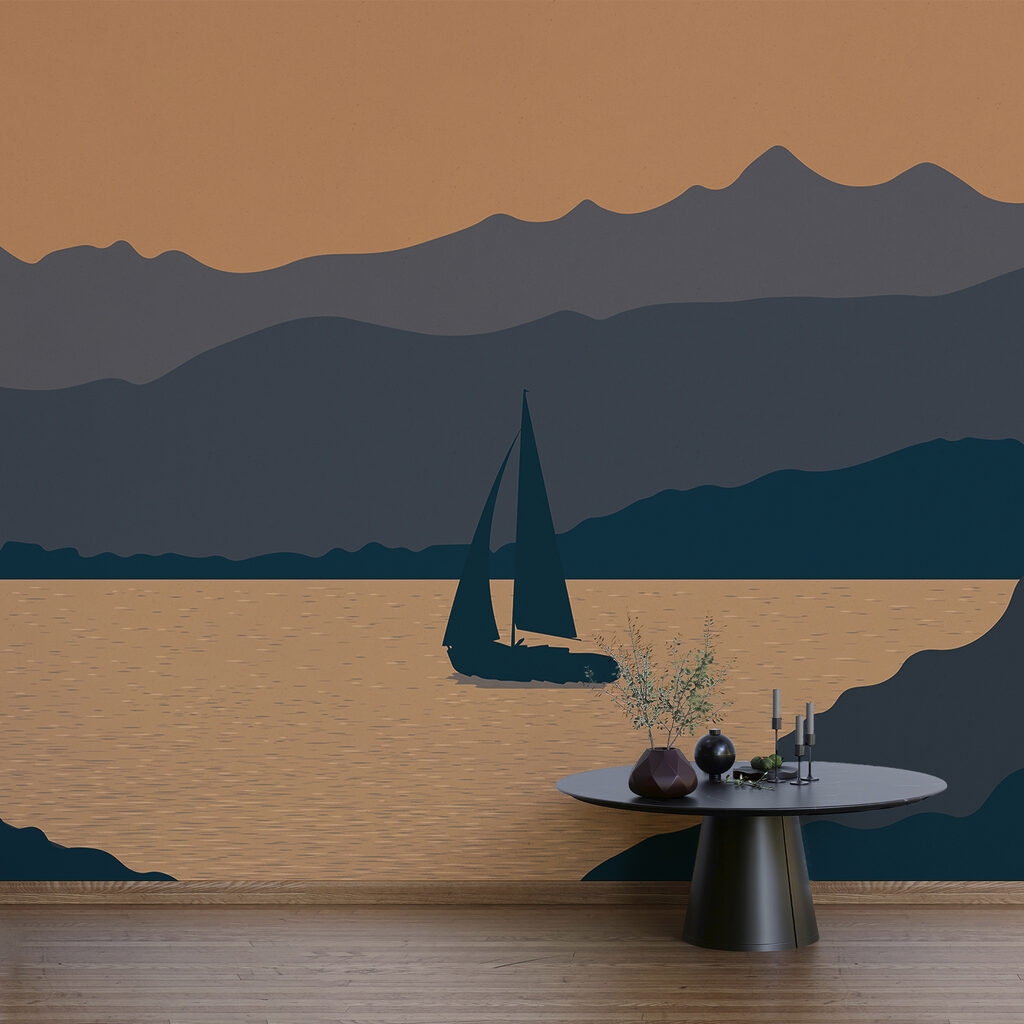 Plachetnica na vode s horami v pozadí