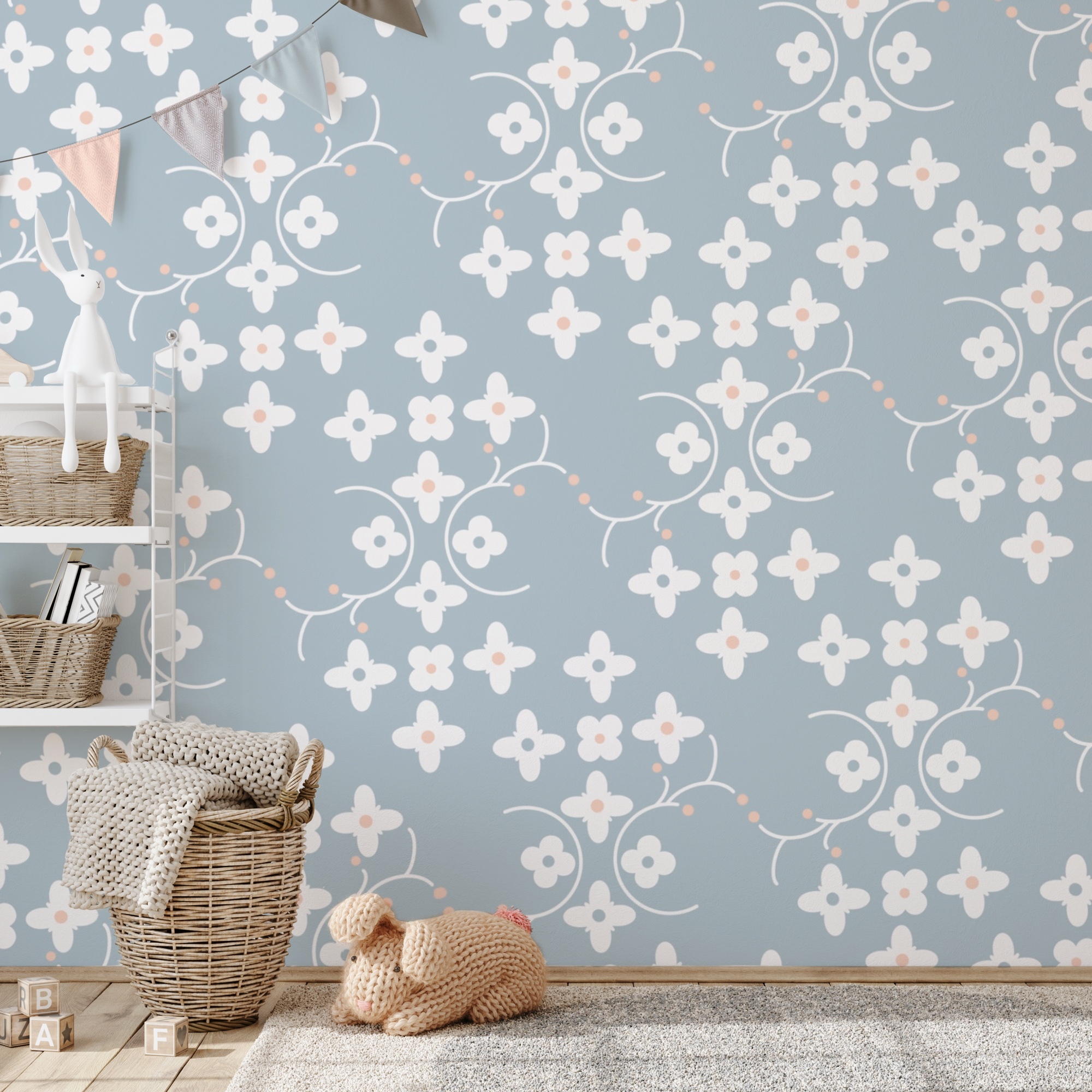 Vzor bielych kvetov a ružových bodiek na modrom pozadí