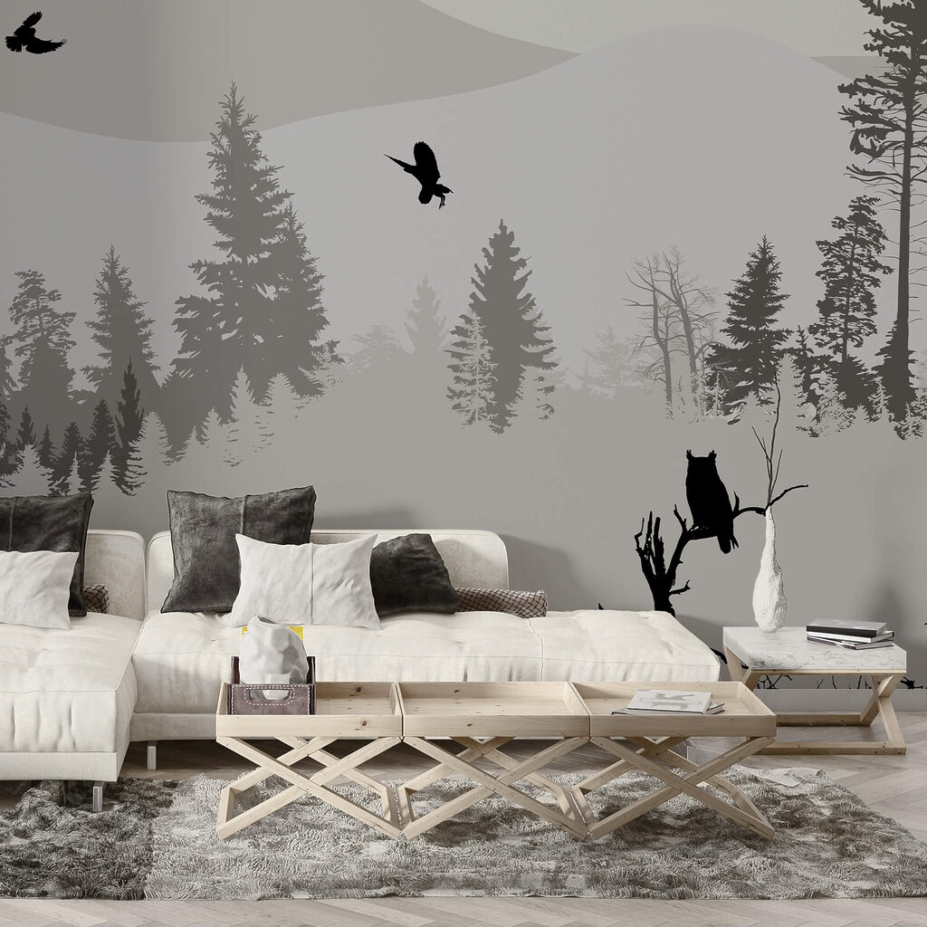 Vtáky letiace nad zasneženou horou