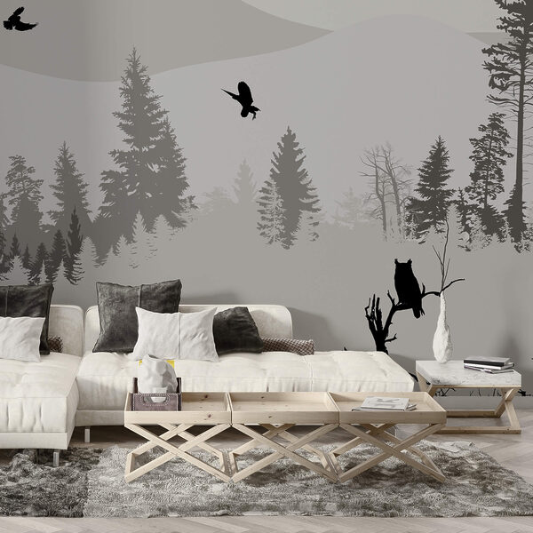 Vtáky letiace nad zasneženou horou