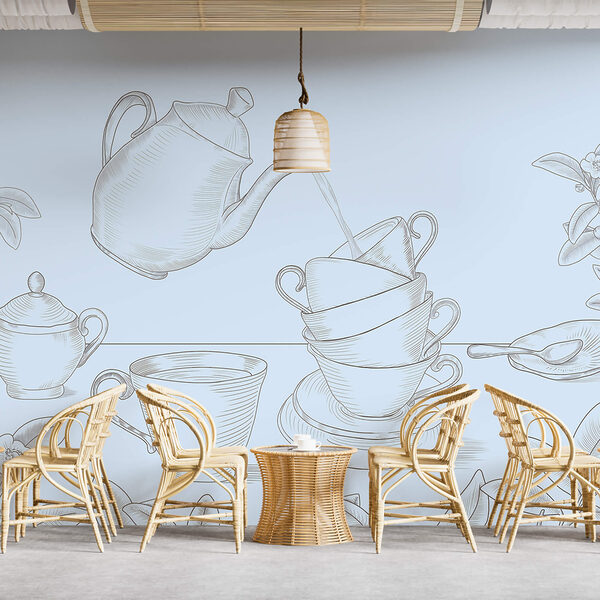 Čajník nalieva do stohu čajových šálok