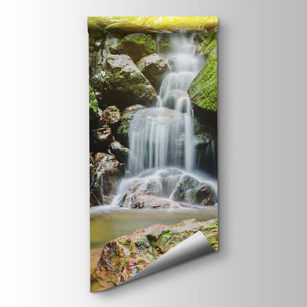 Waterfall over rocks with moss