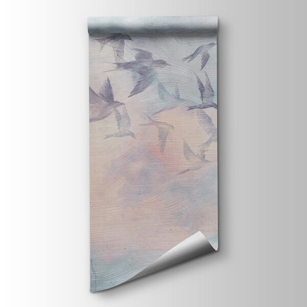 A flock of birds flying in the sky