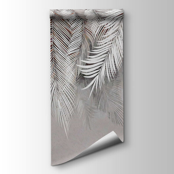 White feather on a gray surface