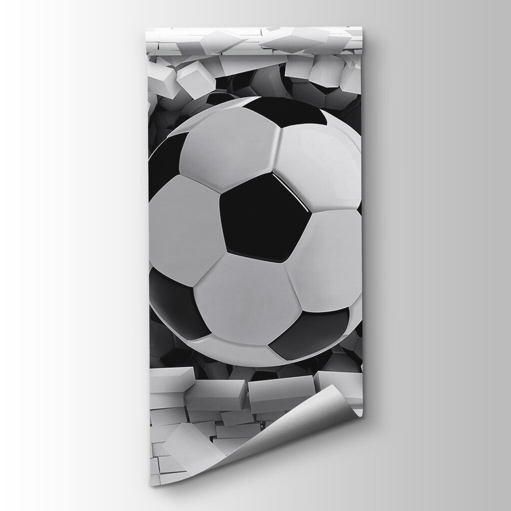 Football ball breaking through a brick wall Football ball breaking through a brick wall