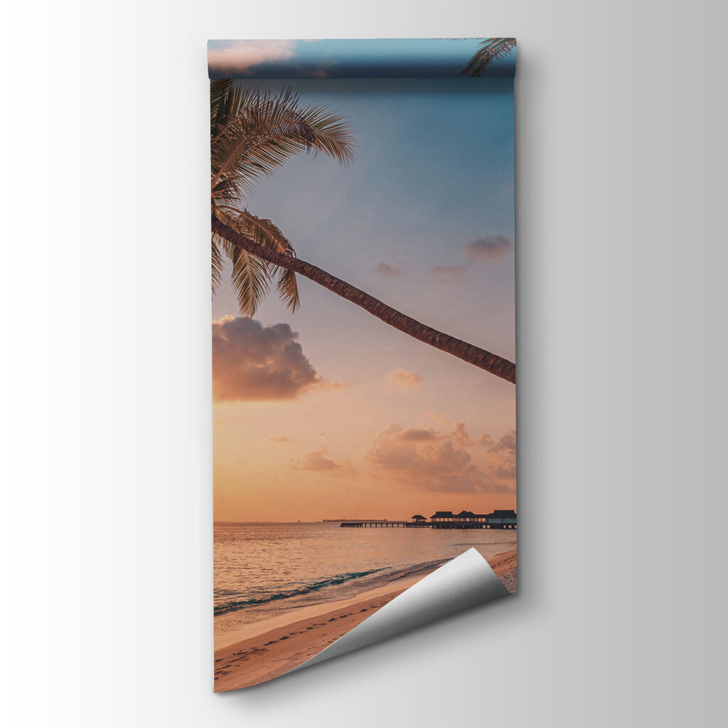 A beach with palm trees and a body of water