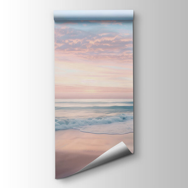 A beach with waves and a pink sky