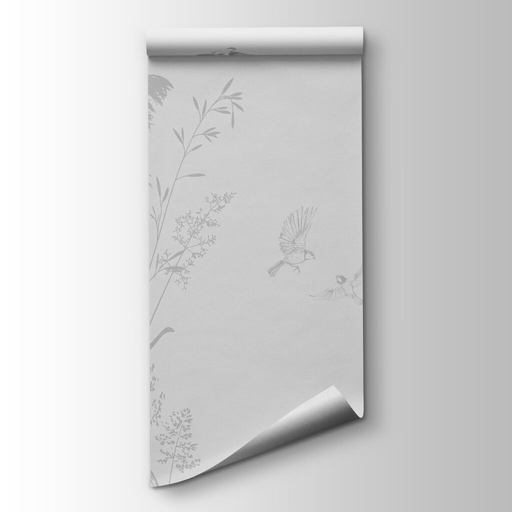 Birds flying over tall grass