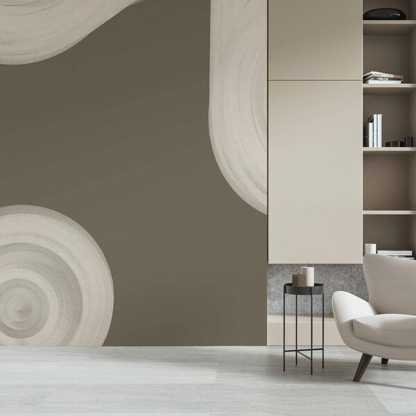 Biely vírivý objekt na hnedom pozadí