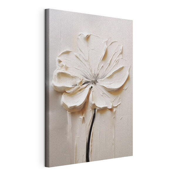 White flower carved into a white surface White flower carved into a white surface