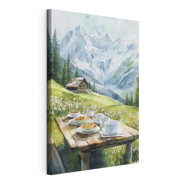 Table with plates of food and cups on it with mountains in the background Table with plates of food and cups on it with mountains in the background