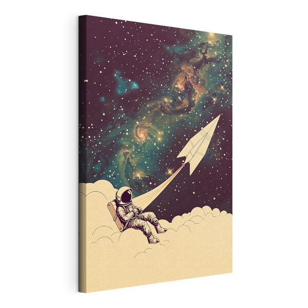 Astronaut sediaci na oblaku s papierovým lietadlom na oblohe Obraz Astronaut sediaci na oblaku s papierovým lietadlom na oblohe
