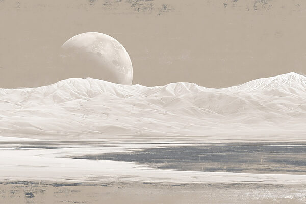 Moon over a snowy mountain
