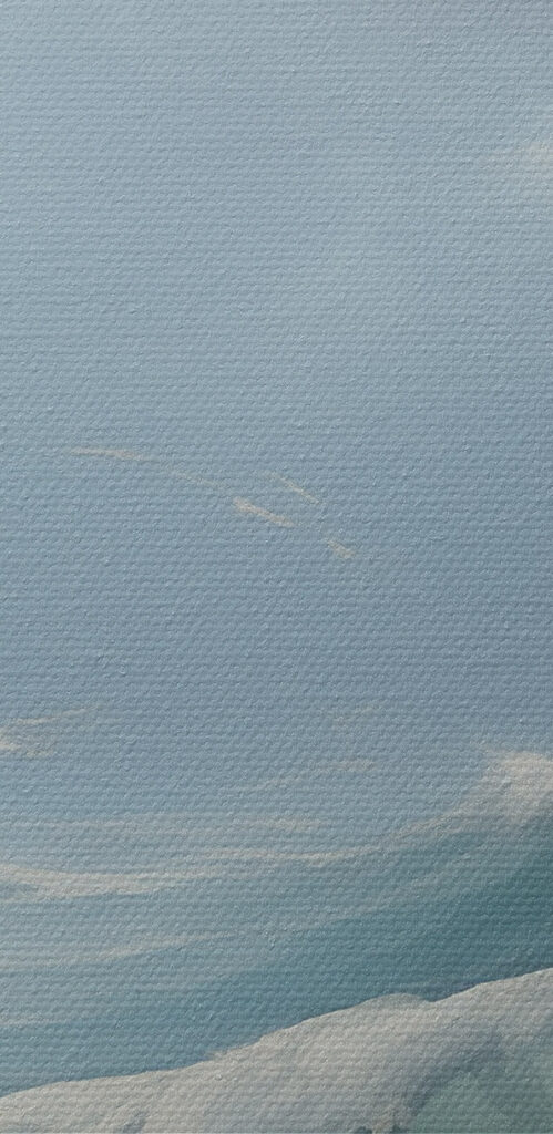 Waves in the ocean with clouds