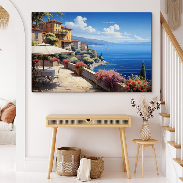 View of a town and the ocean from a balcony
