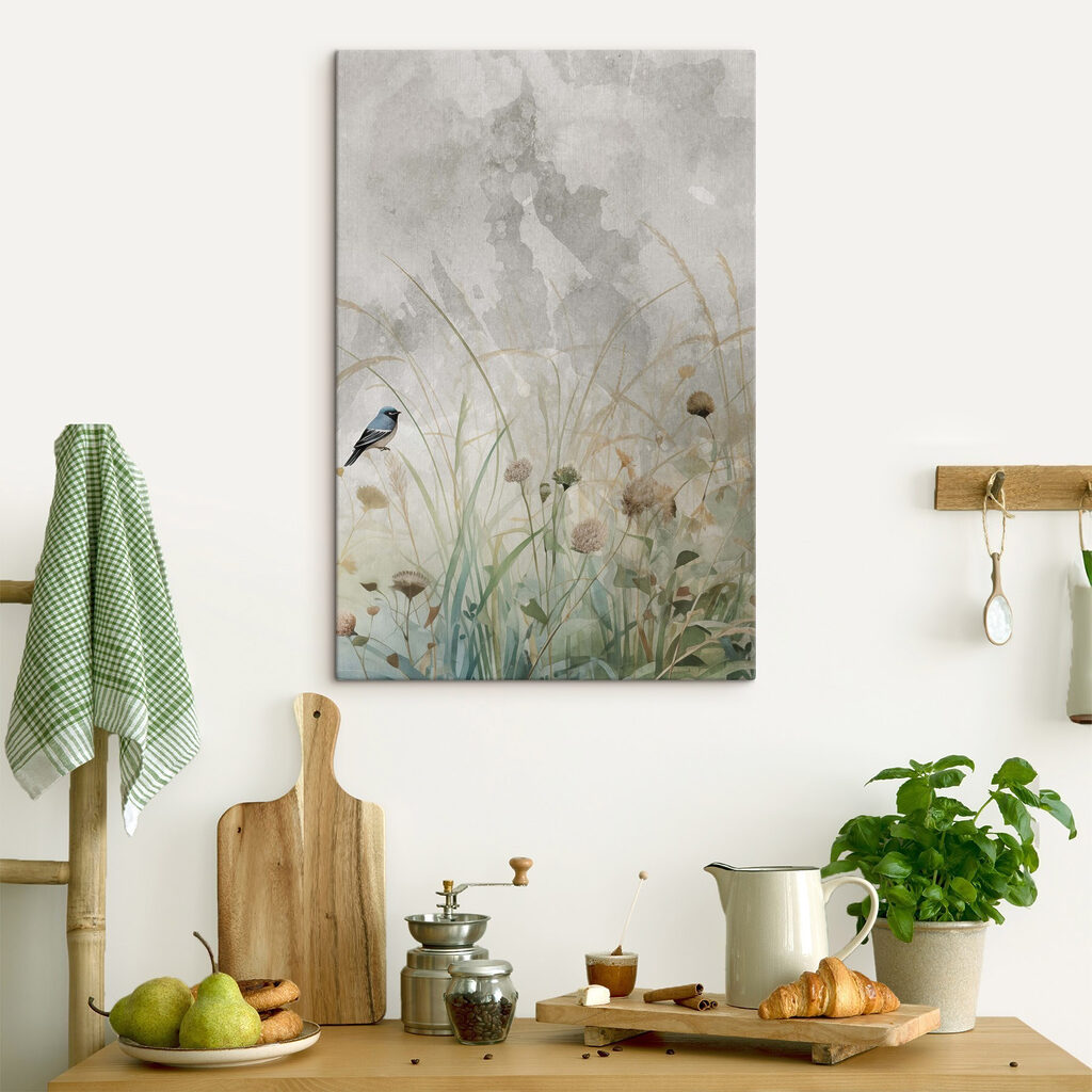 Bird on a branch in a field of grass