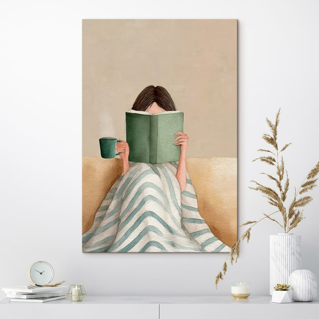 Woman reading a book and holding a cup Woman reading a book and holding a cup