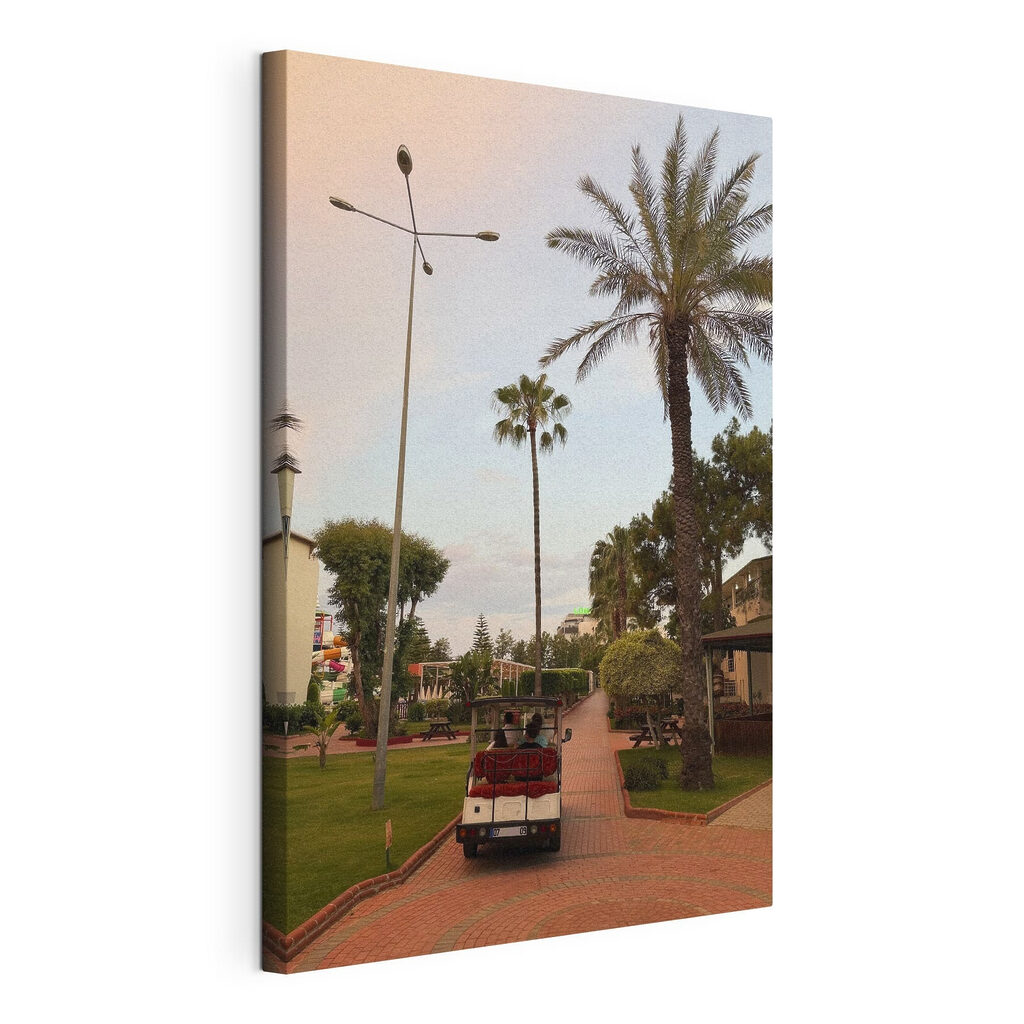 Group of people riding a golf cart Group of people riding a golf cart
